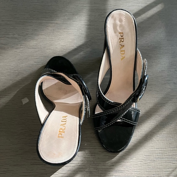 Prada Shoes - PRADA | Luxury Black Leather White Stitch Criss-Cross Buckle Heel | Size 37.5